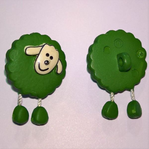 Grøn fåreknap med dingle ben af plastic